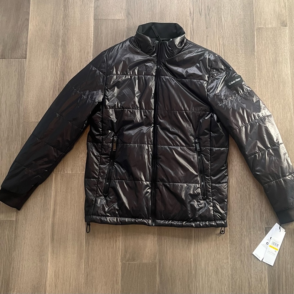 Black Calvin Klein jacket size medium.